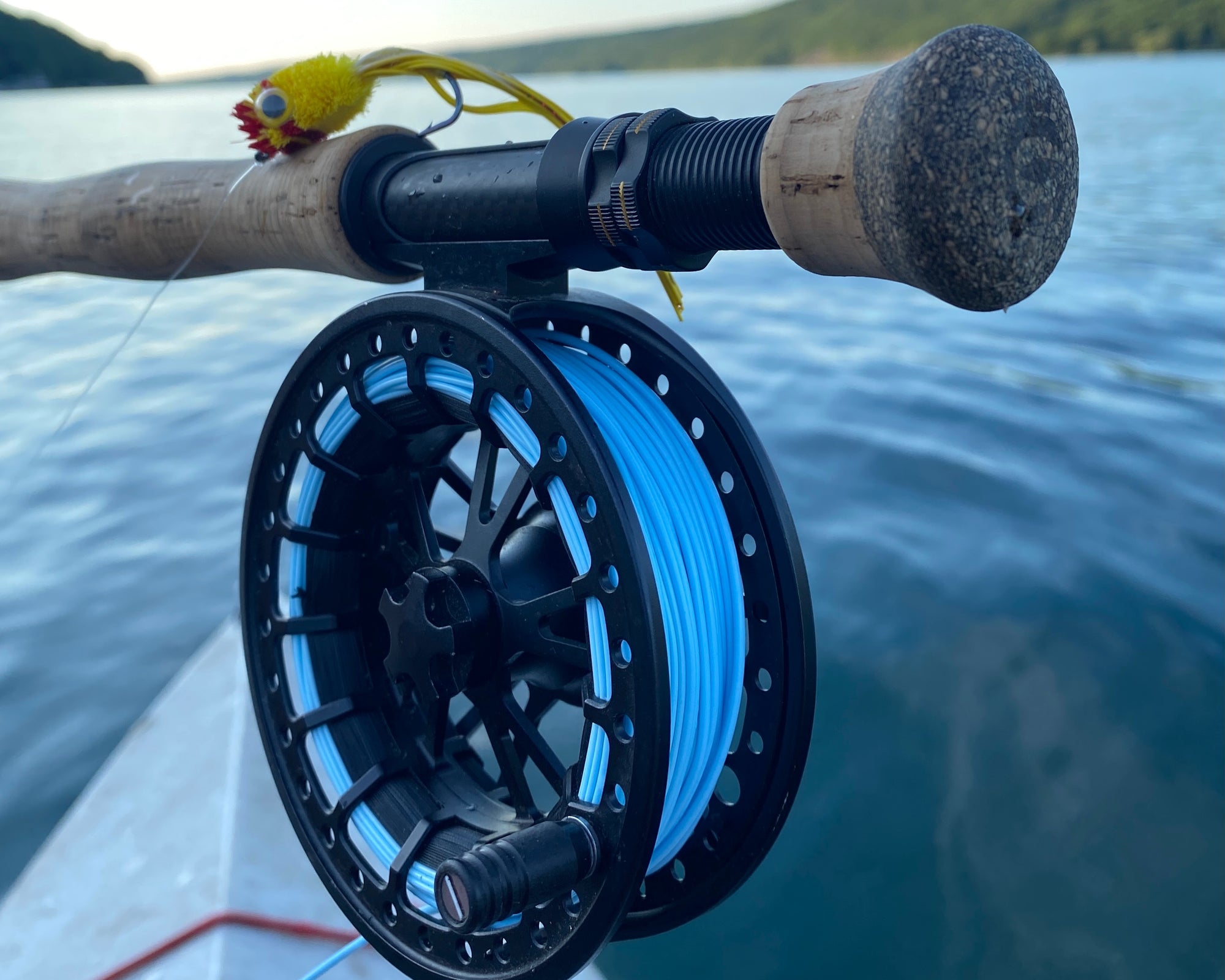 A closeup shot of a fly reel that is lined with 444 Series Big Shot fly line.